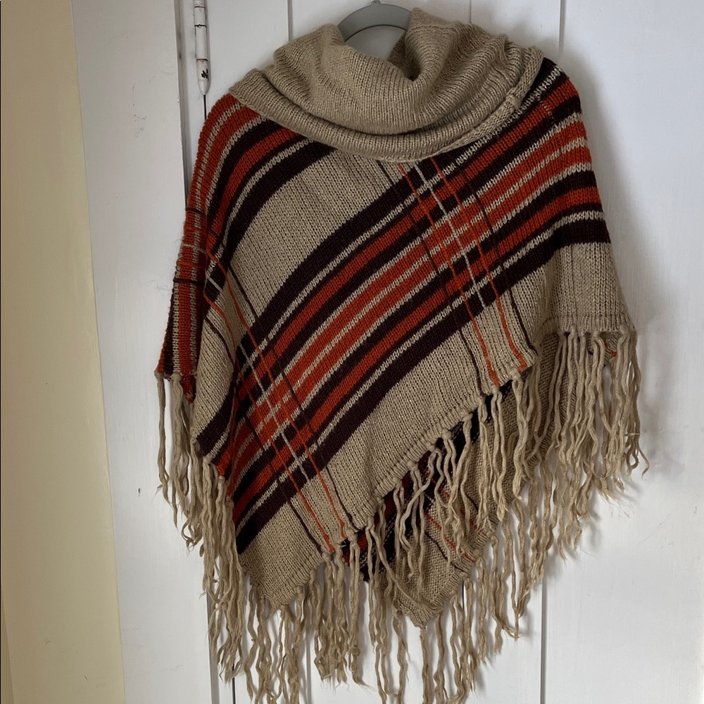 Turtleneck fringe knit poncho brown tan and orange